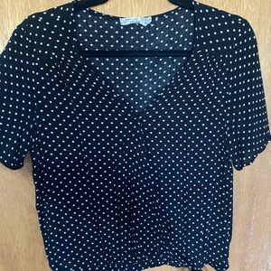 Black with polka dots short-sleeve wrap blouse